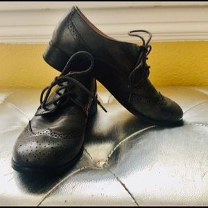 Vintage distressed looking oxfords. The color looks like a dark gray.